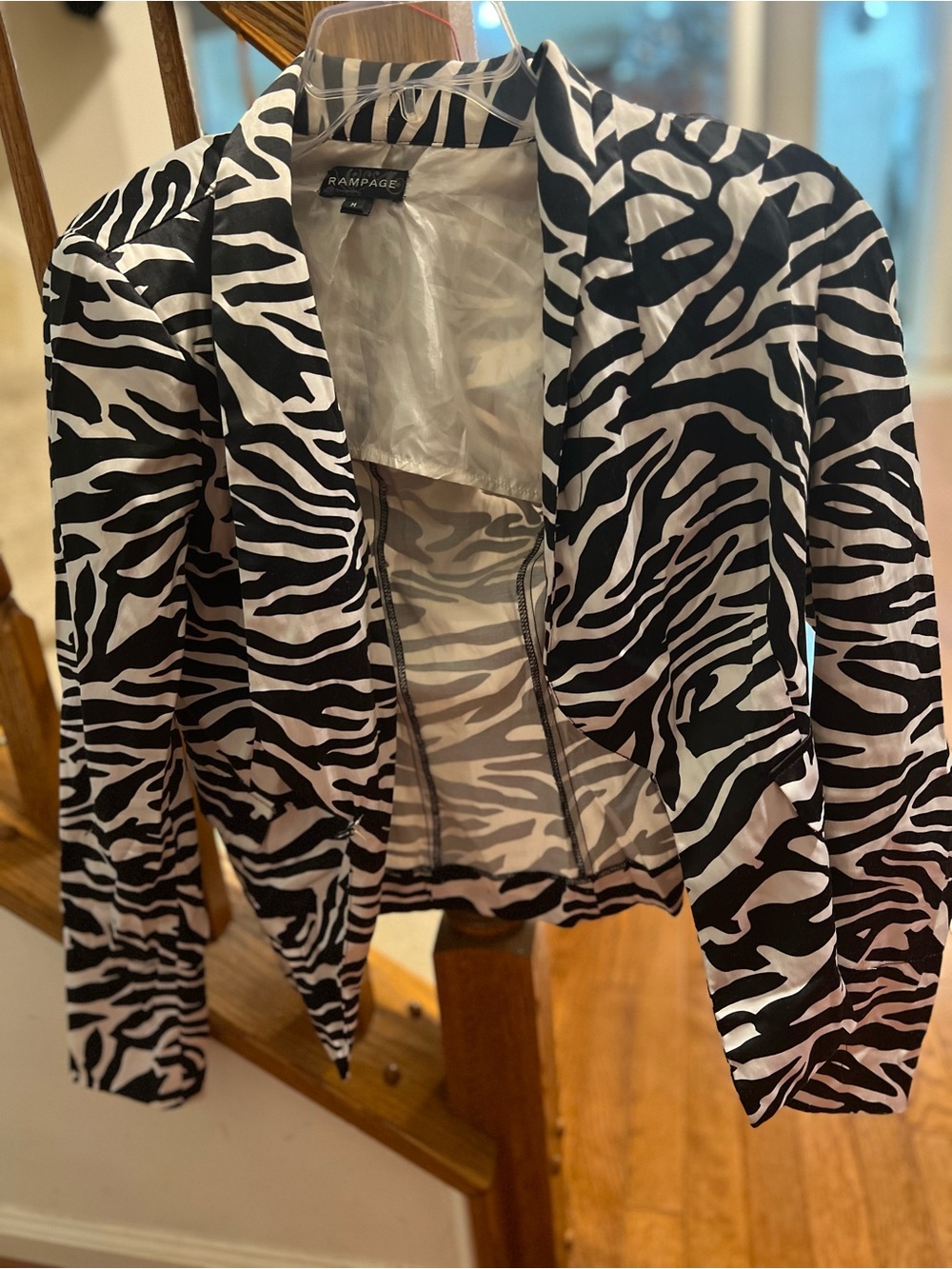 Women's Zebra Blazer featuring a striking black-and-white